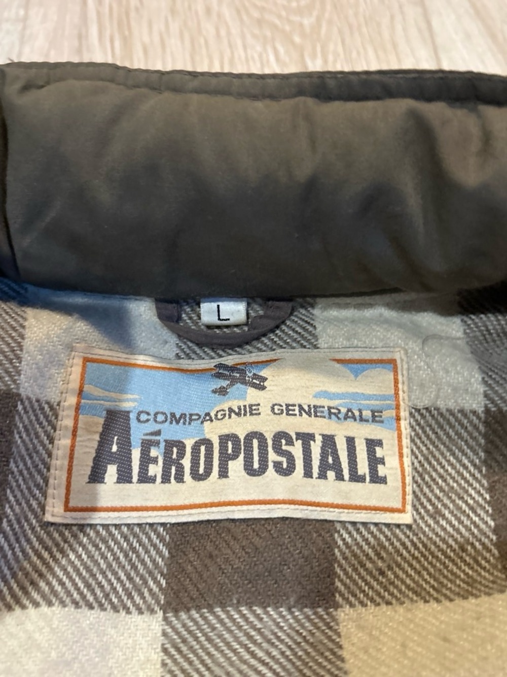Aeropostale Black Puffer Jacket with Gray Plaid Interior